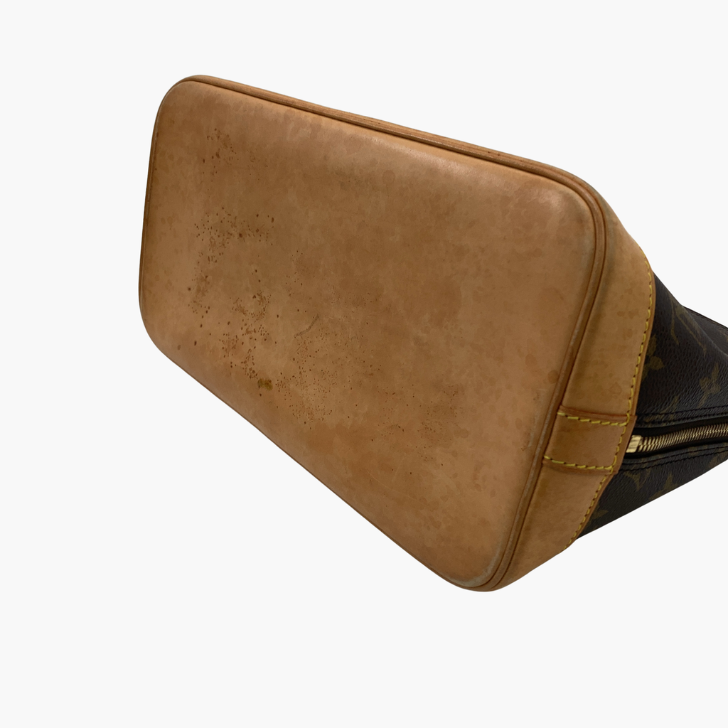 Lys læderbund fra Louis Vuitton Alma